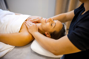 Obraz na płótnie Canvas Expert Massage Session Focusing on Neck Tension