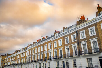 LONDON- Street of upmarket white stucco townhouses in SW3 area of Kensington and Chelsea