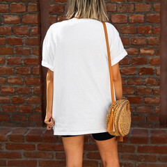 Back t shirt mock up. Young girl wearing blank oversized white t shirt mock up , street design,...