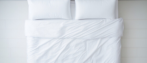 A white duvet cover is seen isolated on a bed in a bed