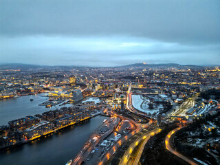 Top aerial view of Oslo city in Norway at evening time. Panorama view of city with modern...