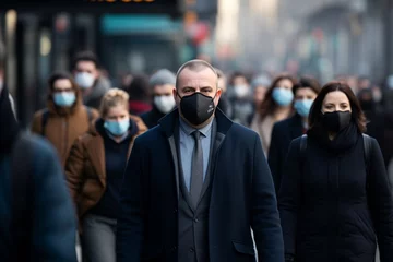 Fotobehang Crowd of people wearing masks walking city street © blvdone