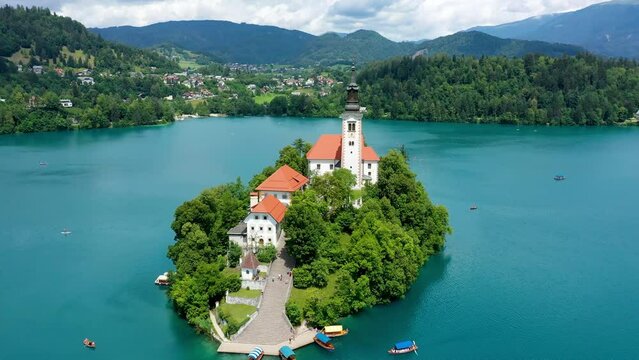 Lake Bled in Slovenia. Beautiful mountains and Bled lake with small Pilgrimage Church. Bled lake and island with Pilgrimage Church of the Assumption of Maria. Bled, Slovenia, Europe.