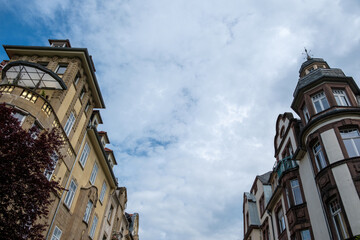 Germany destination Heidelberg old town. Exterior of imposing building, cloudy sky. Under view