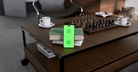 Smartphone place on table, Green screen of Cellphone, Close up display mobile phone with mock up,...