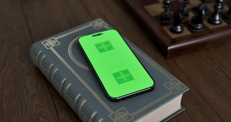 Smartphone place on table, Green screen of Cellphone, Close up display mobile phone with mock up,...