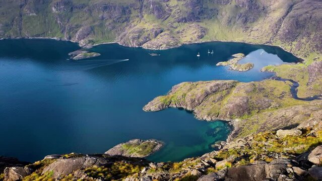 Isle of Skye Scotland mountains - Loch Na Cuilce lake view from peak of Sgurr Na Stri - boats on lake and peak of Gars Bheinn at the end