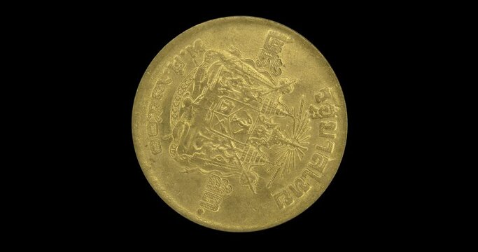 Reverse of Thailand coin 25 satang 1957, isolated in black background. Seamless animation in 4k resolution video.