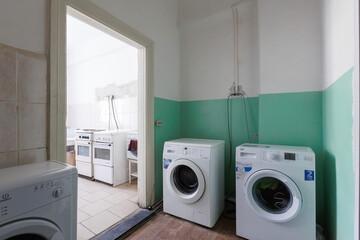modern bathroom room with toilet and washing machine