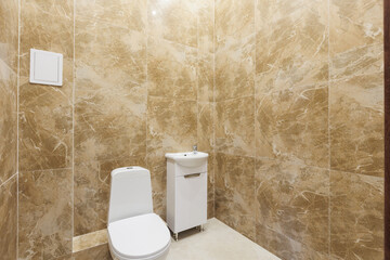 modern bathroom room with toilet and washing machine