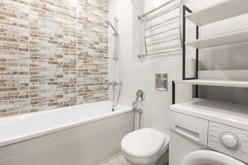 modern bathroom room with toilet and washing machine