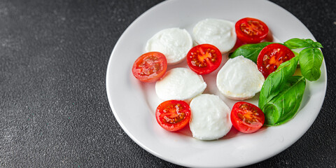 caprese salad mozzarella, tomato, basil fresh food tasty healthy eating cooking appetizer meal food snack on the table copy space food background rustic top view