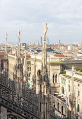 View of Piazza del Duomo with the Galleria Vittorio Emanuele II from the top of the Milan Cathedral (Duomo di Milano) in Milan, Italy