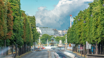 Fototapeta na wymiar The beautiful Concorde Square in Paris timelapse - the famous fountain at obelisk called Fontaine des Fleuves - PARIS, FRANCE