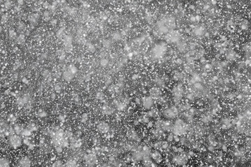 Falling Snowflakes on a Black Background, Enhance Your Project with Snowy Texture. Use as a...