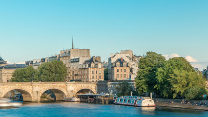 Sunset timelapse over Seine river, Pont Neuf bridge and Cite island with Royal palace. Paris, France