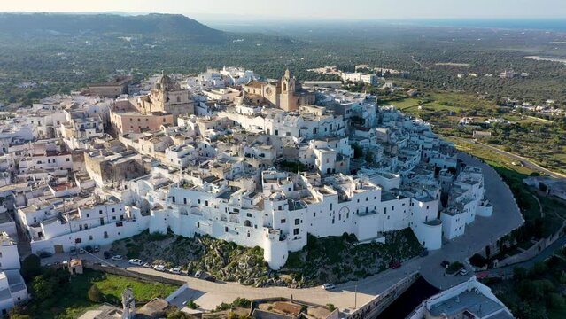 View of Ostuni white town, Brindisi, Puglia (Apulia), Italy, Europe. Old Town is Ostuni's citadel. Ostuni is referred to as the White Town. Ostuni white town skyline and church, Brindisi, Italy.