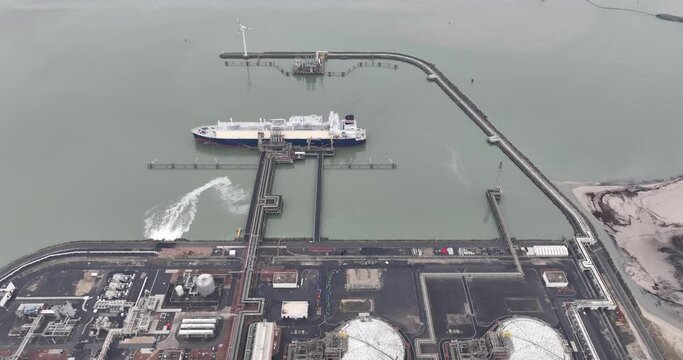 LNG terminal, liquefied natural gas, mixture of mainly methane with possible residual gases such as nitrogen, propane and ethane. Transportation over seas by LNG ship tanker.