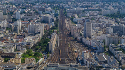 Fototapeta premium Top view of Paris skyline from observation deck of Montparnasse tower timelapse. Paris, France
