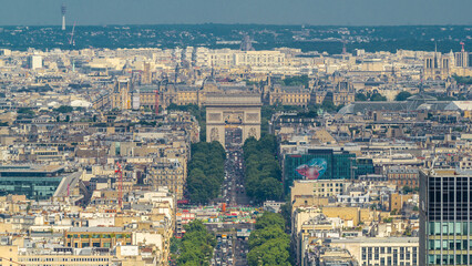 Aerial view of Paris and The Arc de Triomphe with Champs Elysees timelapse from the top