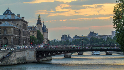 Le Pont D'Arcole bridge after sunset with boats day to night timelapse, Paris, France, Europe