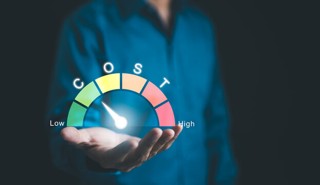 Cost management concept. Cost efficiency analysis, Cost reduction, Businessman analyzing cost efficiency with a virtual gauge. Effective business, Expense reduce, financial management and budgeting,
