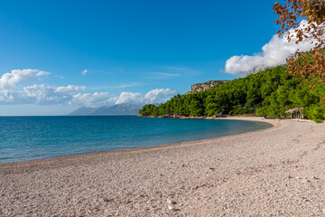 Idyllic stone beach of coastal town Makarska, Dalmatia, South Croatia, Europe. Scenic view of...
