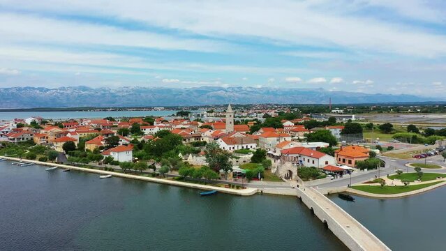 Historic town of Nin laguna aerial view with Velebit mountain background, Dalmatia region of Croatia. Aerial view of the famous Nin lagoon and medieval in Croatia