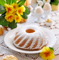 Bundt cake, babka with powdered sugar, close up view. Traditional Easter bundt cake
