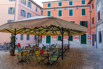 beautiful colorful square in Rovinj old town with restaurants