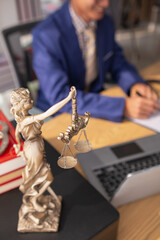 statue of god Themis Lady Justice is used as symbol of justice within law firm demonstrate...