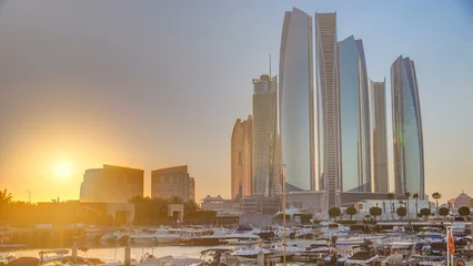 Gordijnen Al Bateen marina Abu Dhabi timelapse with modern skyscrapers on background © neiezhmakov