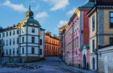 Obraz premium Colourful buildings line Birger Jarls Torg in Gamla Stan, Stockholm