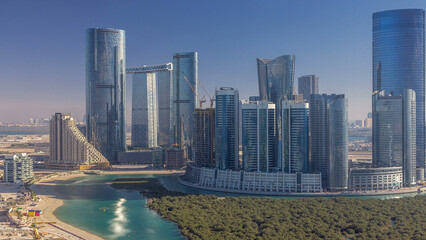 Buildings on Al Reem island in Abu Dhabi timelapse from above.