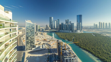 Buildings on Al Reem island in Abu Dhabi timelapse from above.