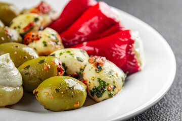 vegetable snack mix olive, mozzarella, stuffed pepper, mushroom antipasto fresh antipasti food tasty eating appetizer meal food snack on the table copy space food background 