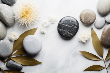 Spa stones with flowers on marble