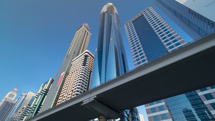 Fototapeta na wymiar Skyscrapers at the Sheikh Zayed Road in Dubai timelapse hyperlapse