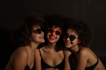 Three Cute Young Teens in Black Bikini with Sunglasses, Studio Photo
