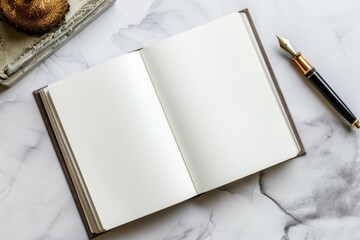 Open classic hardcover notebook and a fountain pen on a marble table - obrazy, fototapety, plakaty