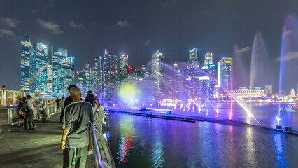 Light and Water Show along promenade in front of Marina Bay Sands timelapse