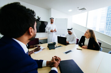 Multiethnic business team working in Dubai