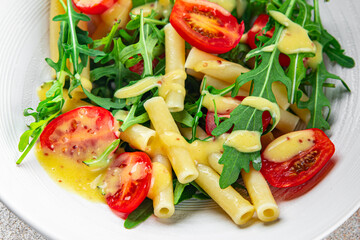 pasta salad tomato, arugula, pasta fresh food tasty eating meal food snack on the table copy space food background 
