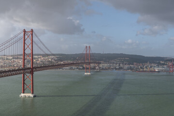 The 25 Aprile bridge is a suspension bridge over the Tagus River estuary - 756730803