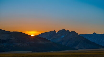 Obraz premium sunset over the mountains