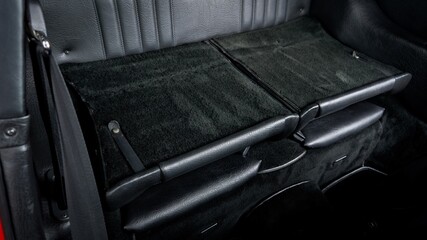 Rear seat of a car folded down