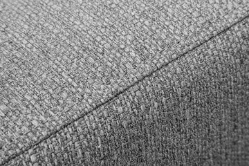 Textured grey furniture fabric with stitching