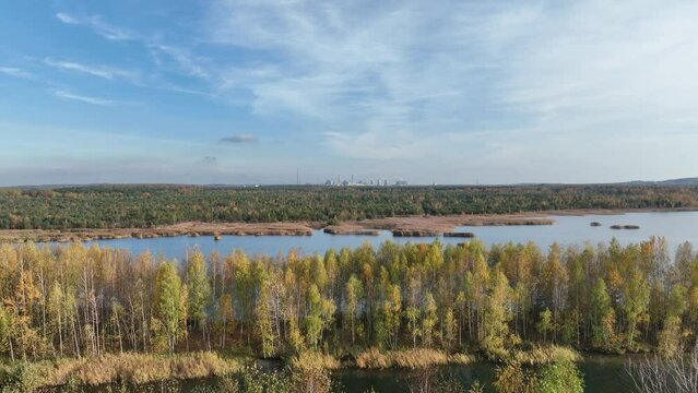 Beautiful autumn lake with sand islands like atol. Lake pogoria in Dabrowa Gornicza Poland aerial drone photo view