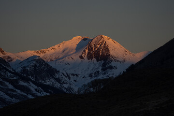 Alpenglow shining on the Paradise Divide mountains near Crested Butte, Colorado