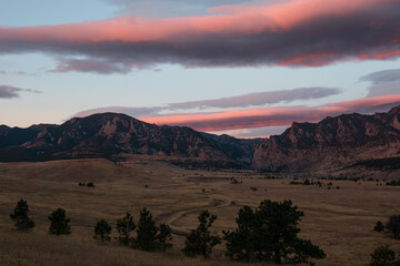 Cotton candy clouds over the flatirons